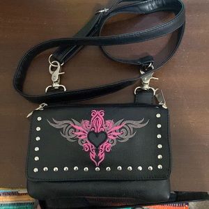 Perfect for carrying all you things while riding. hook it to your pants/carry